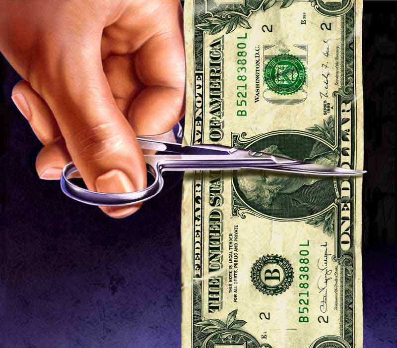 دانلود تصویر با کیفیت قیچی کردن اسکناس دلار